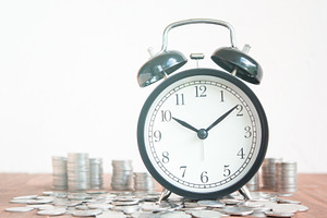Concept with clock and coins featuring clock, money, and concept