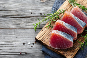 Fresh raw tuna fillets with herbs, a Food & Drink Photo by MistyDay