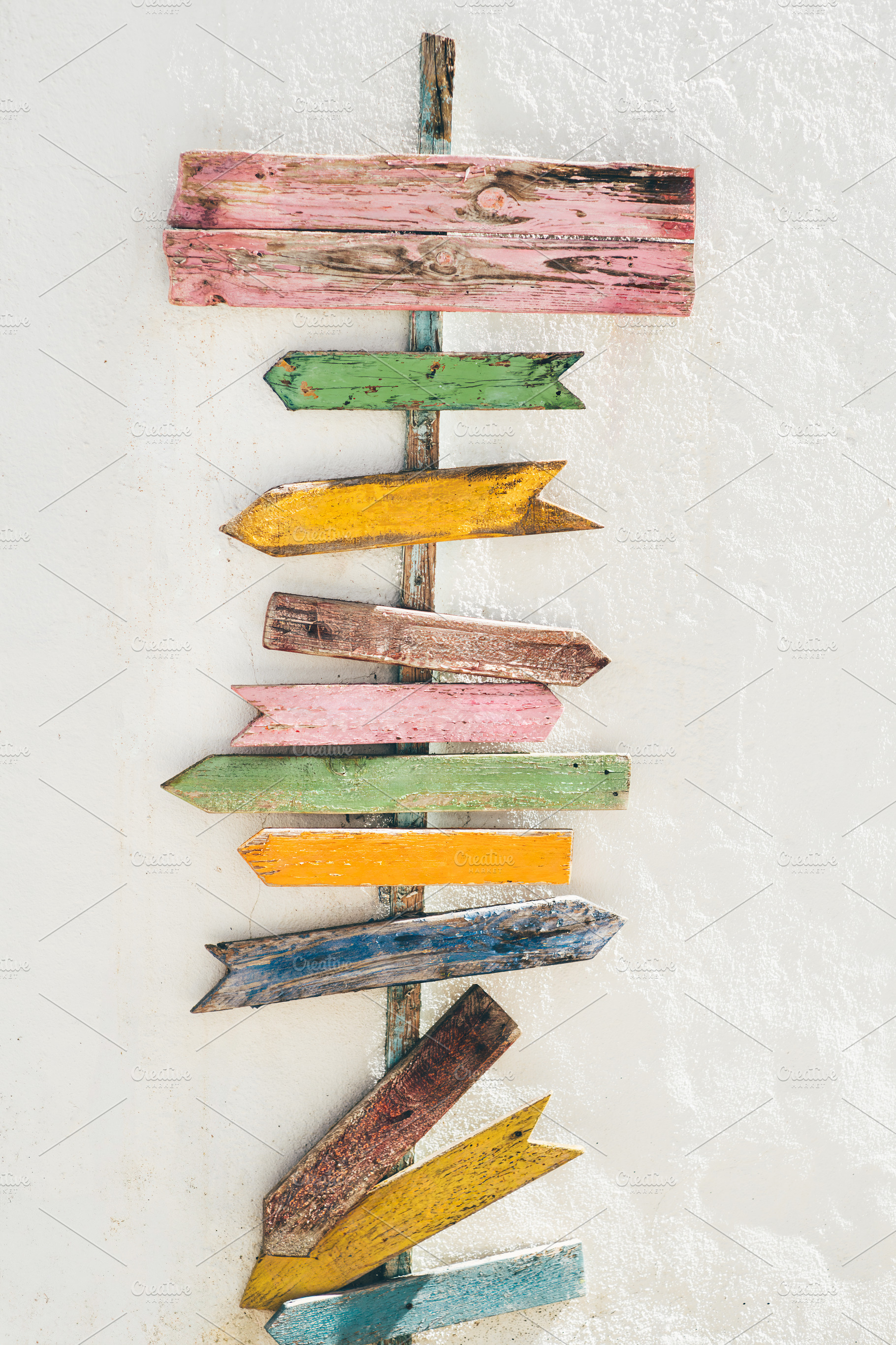 Colorful arrow sign mock-up wall, a Photo by SkyNext