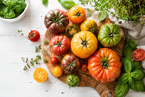 Tomatoes basil on wood, a Photo by Beautiful things