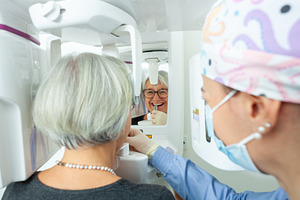 Senior woman undergoing a dental panoramic radiography with modern equipment, a Health & Medical Photo by Antonio Gravante Market