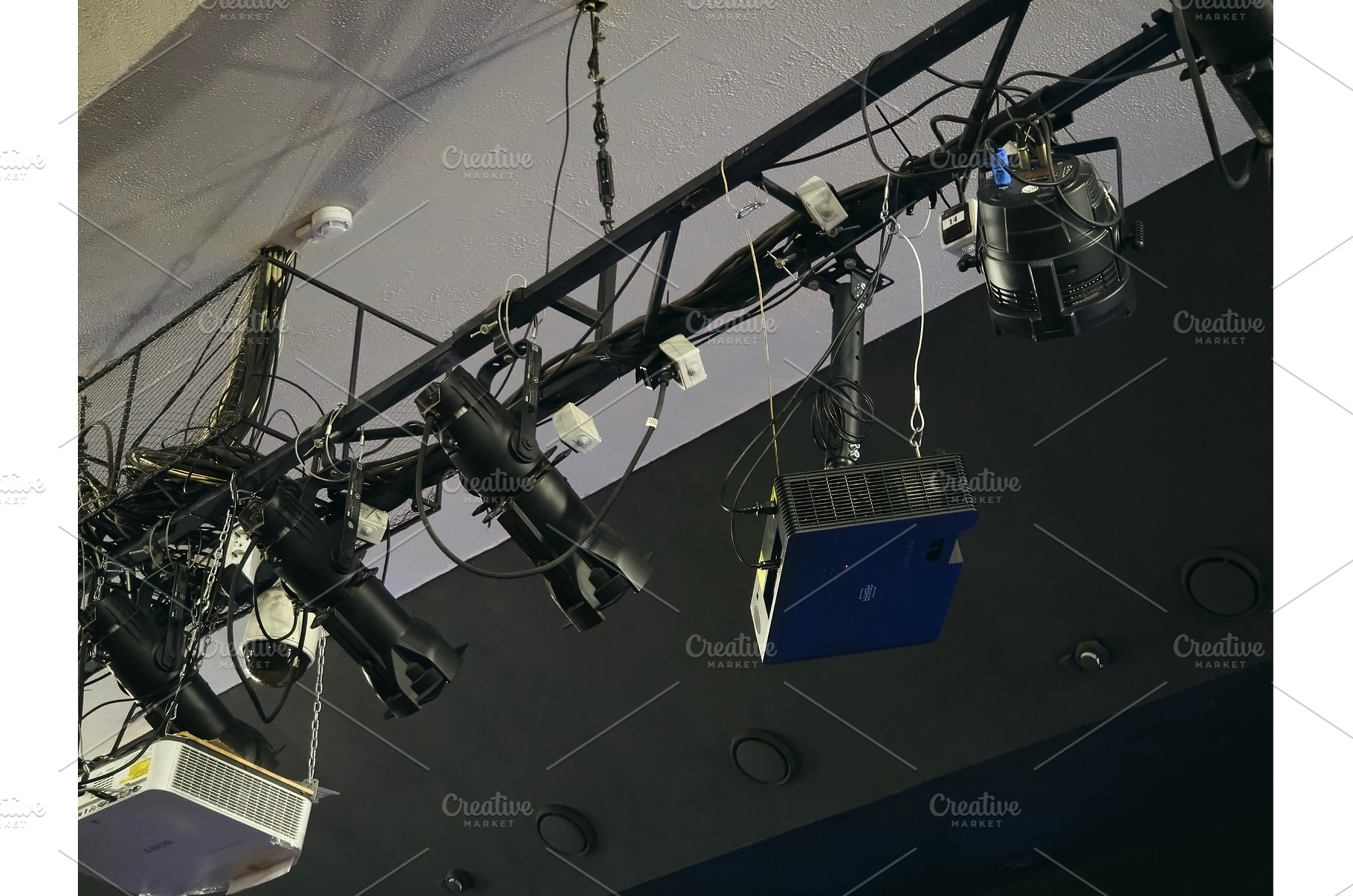 Lighting equipment hangs from the, an Industrial Photo by darksoul72