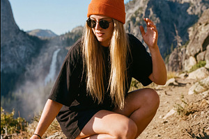 Young woman hiker at scenic mountain, a Person Photo by Virgo Studio