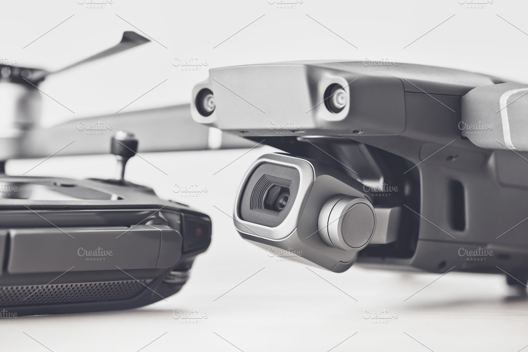 Close-up of a drone on a table, a Technology Photo by kirill.makes.pics