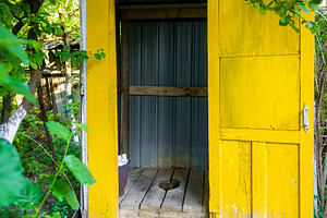 Traditional Outdoor Wooden Outhouse, an Architecture Photo by Ales Munt