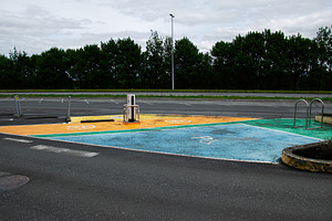 Colorful outdoor parking space for pets in Reykjavik, Iceland under cloudy sky, a Photo by AS photostudio