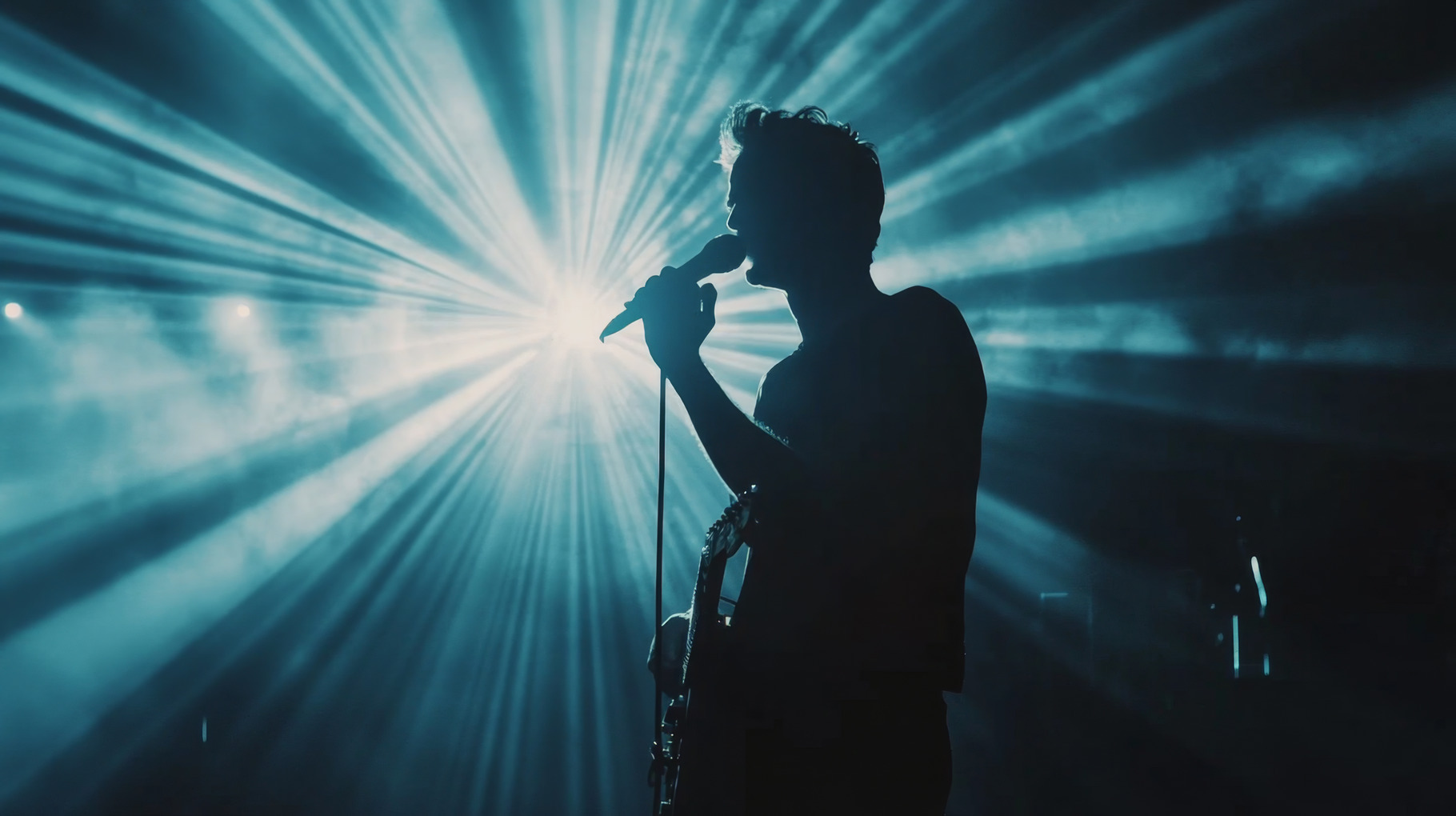 Singer Performing on Stage with Dramatic Light Show, an Abstract Photo ...