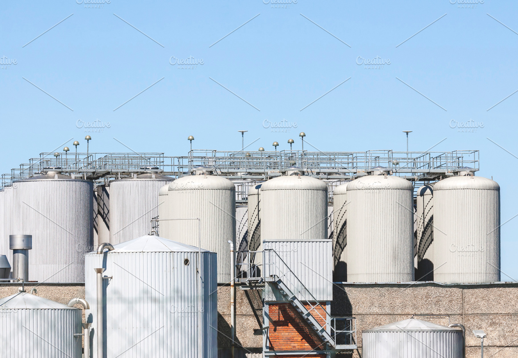 Industrial plant and storage tanks, an Industrial Photo by BOOCYS