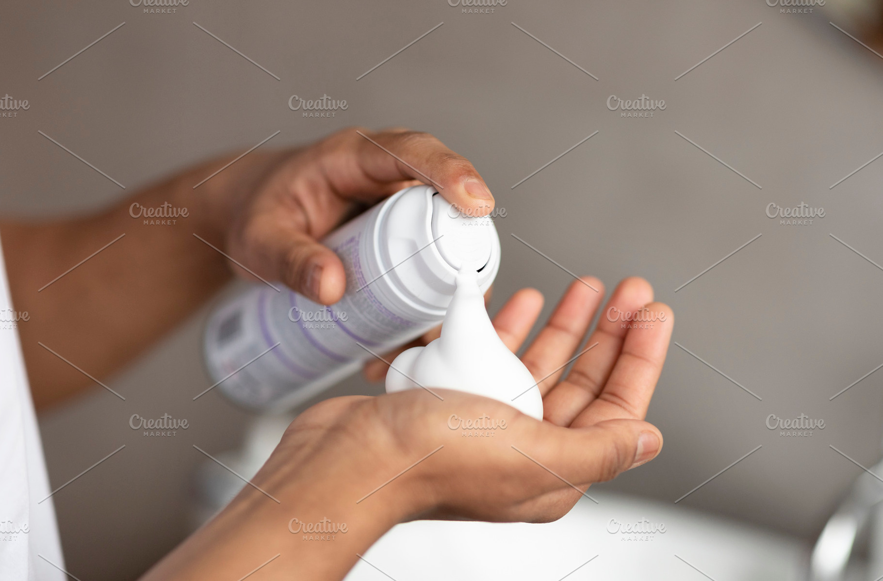 Unrecognizable man applying shave foam on hand, standing in bathroom and prepar, a Person Photo by Prostock-Studio