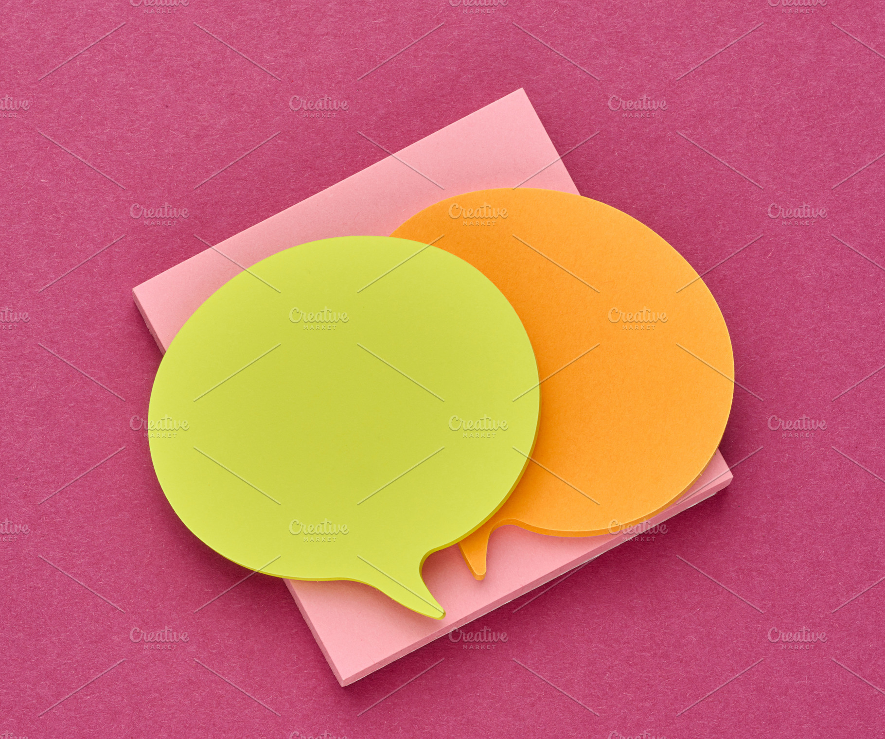 Multicolored thought cloud-shaped sticky notes on a square block, a Business Photo by ndanko