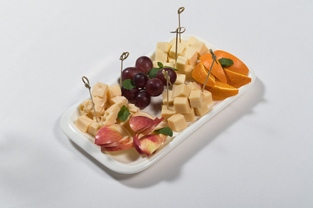 Sliced fruit and cheese on a p stock photo containing cheese and food, a Food & Drink Photo by oleghz