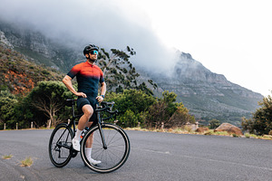 Young male cyclist relaxing, a Sports & Recreation Photo by Artem Varnitsin
