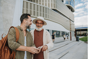 Mature son and father traveling, a Person Photo by HalfPoint