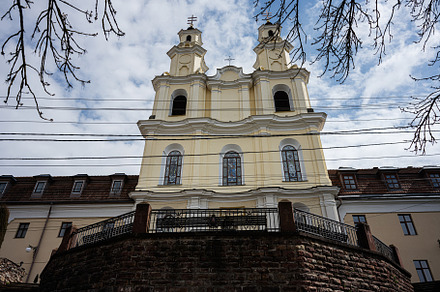 Historic Orthodox church building in Buchach under a partly cloudy sky. Monaste, a Photo by AS photostudio