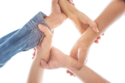 Hands in grabbing and holding wrist together in world unity and, a Person Photo by Ministocker