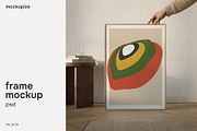 DIN A Person Holding Frame Mockup, a Household Mockup by mockupize (Thumbnail 1 of 7)