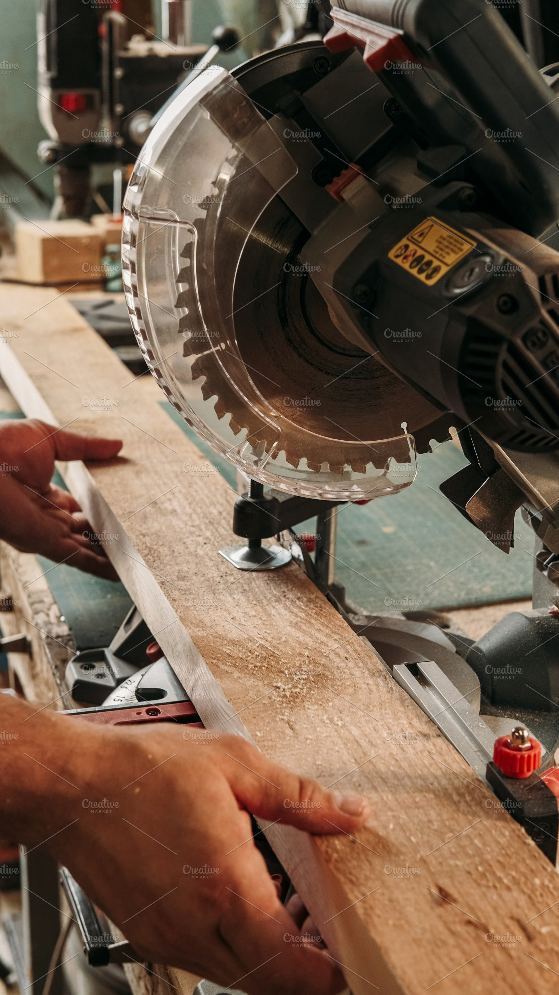 Carpeting process woodwork service joiner saw, a Person Photo by Photo Drive Studio