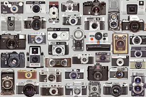 Set of an old vintage photo cameras, a Technology Photo by BOOCYS