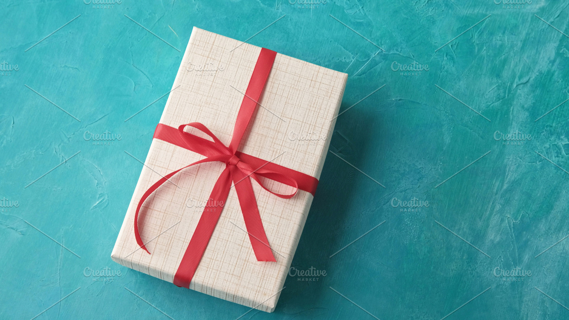 Birthday surprise party present wrapped gift box, a Background Photo by Photo Drive Studio
