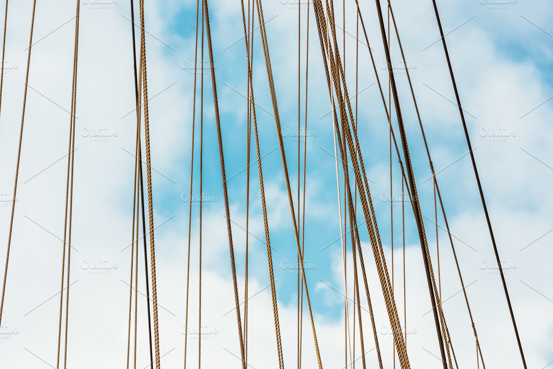 Sailboat ropes against blue sky, abs, a Photo by Dvoevnore photos