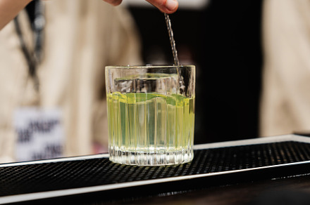 Preparation of a delicious cocktail based on gin and vodka.