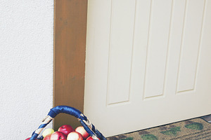 Basket of fresh apples at doorway, a Food & Drink Photo by BOOCYS