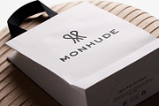 Logo Mockup Shopping Bag on a Puff, a Product Mockup by Asylab (Thumbnail 1 of 5)