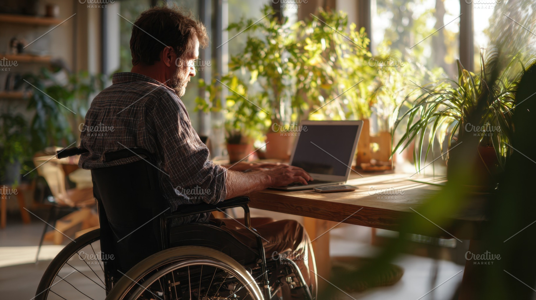Man on laptop in bright room, a Photo by Beautiful things
