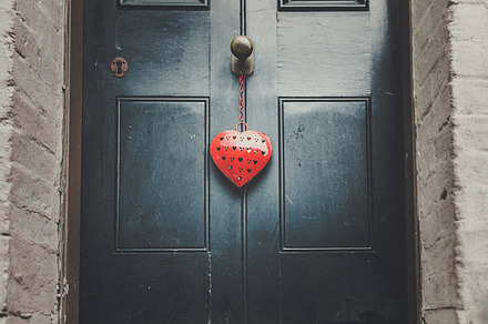 Red heart on door