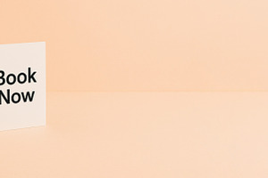 Simple card with Book Now text on pe, a Photo by Dvoevnore photos