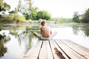 Summer vacation boy at the lake