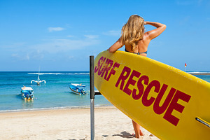 Lifeguard stand by surf rescue board featuring lifeguard, surf, and saving