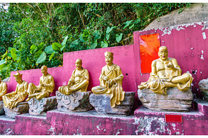 Statues on the way to the ten thousand buddhas monastery in hong kong, an Architecture Photo by Leonid Andronov