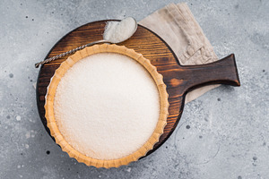 Versatile white sugar in a rustic bowl, ready to enhance dessert, a Food & Drink Photo by composter-box@mail.ru
