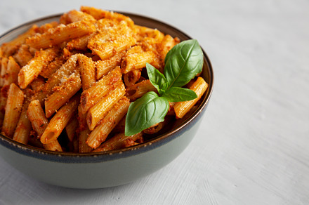 Homemade Tomato Pesto Pasta with Cheese and Basil in a Bowl, sid, a Food & Drink Photo by LiudmylaChuhunova