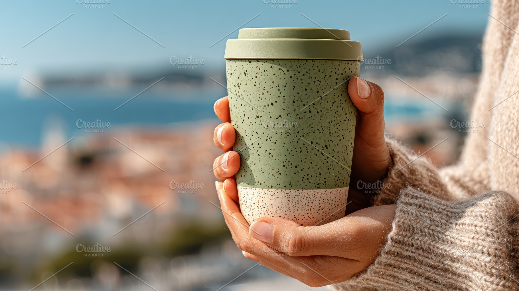 Hands holding reusable coffee cup sc, a Photo by Pixeness Studio