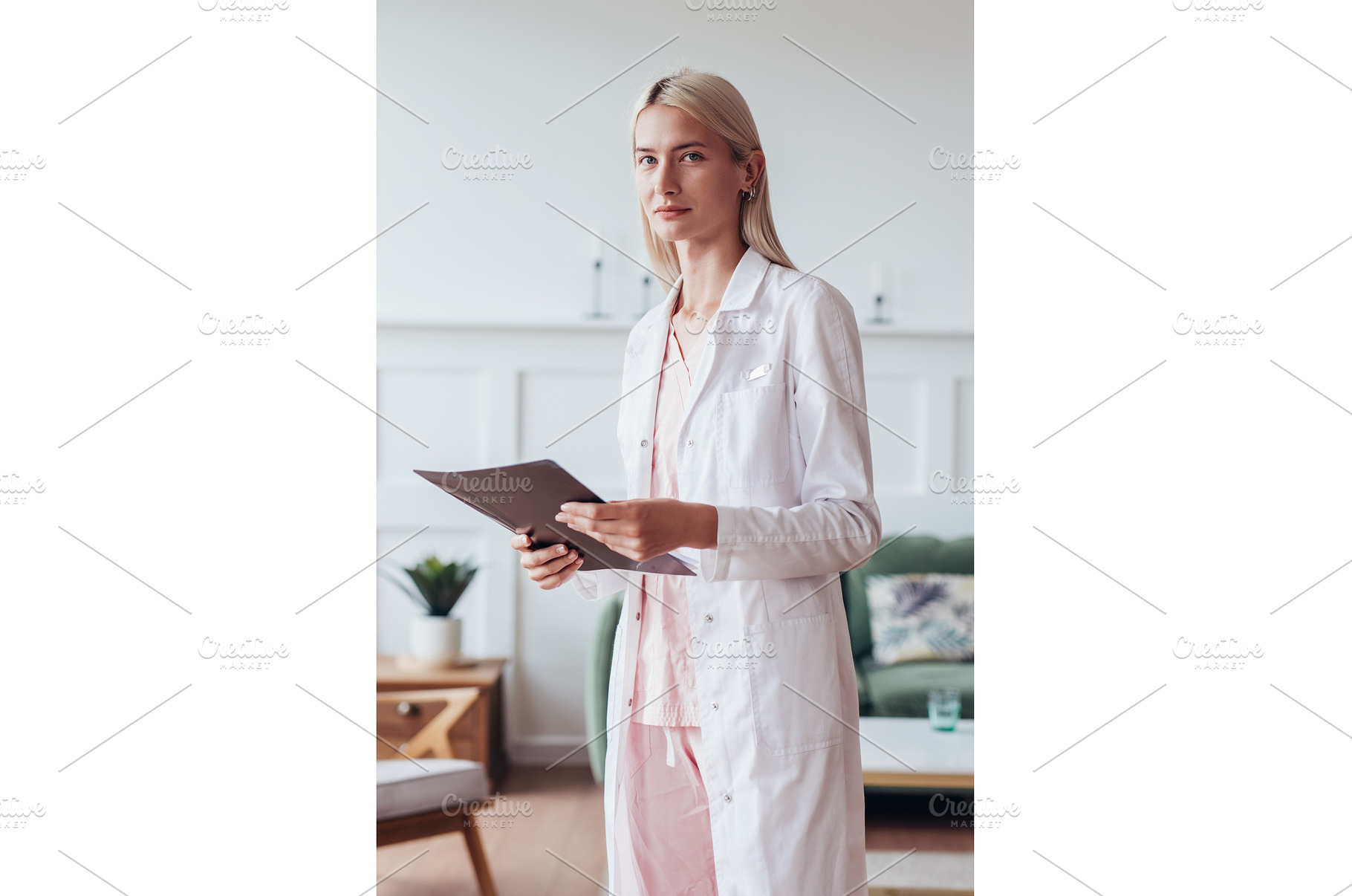 Portrait of female doctor in office, a Health & Medical Photo by undrey
