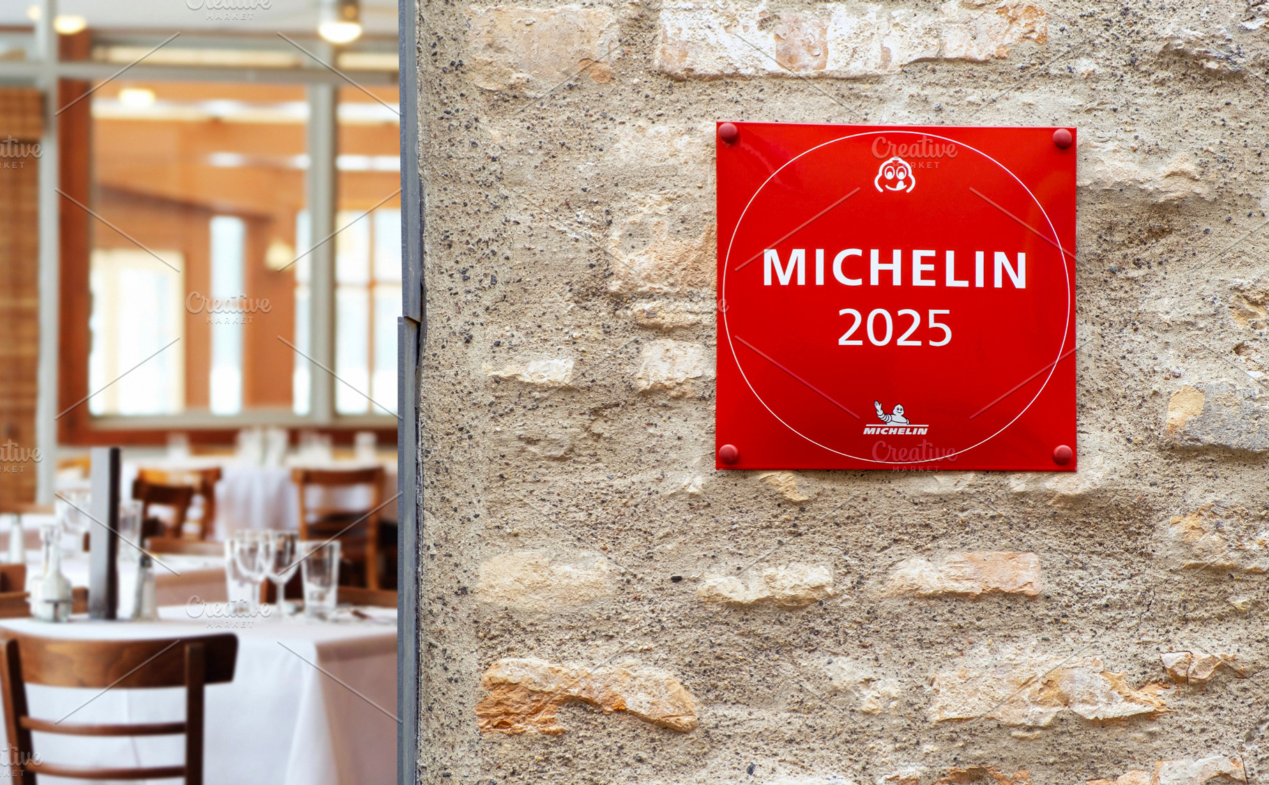 Michelin Guide sign on the wall, a Business Photo by BOOCYS