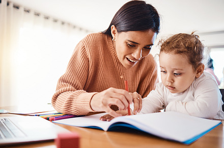 Learning, education and mother with child drawing in book in home for studying, homework or homeschool. Early development, growth and creative boy with happy mama teaching him art, bonding and care., a Photo by Peopleimages.com