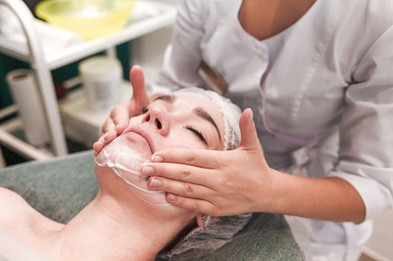 Doctor beautician makes cosmetic, a Photo by borodai94