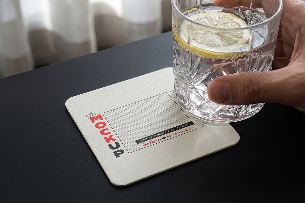 Coaster with Drink and Hand Mockups, a Merchandise Mockup by Luuqas Design (Photo 3 of 3)