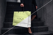 Paper Shopping Bag Mockup with Model, a Packaging Mockup by graphypix (Thumbnail 3 of 4)