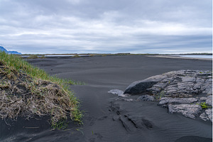 Black sand beach known as Bulandsnes, a Nature Photo by Backyard Stock
