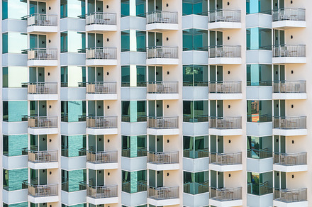 Pattern of balconies and windows stock photo containing pattern and balcony, an Architecture Photo by Tzido Gallery