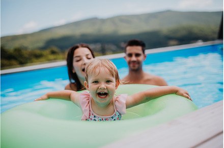 Young family with small daughter in