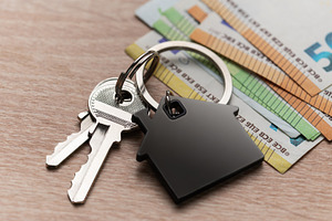 Home ownership investment with euro currency and house key, a Business Photo by Olena Rudo