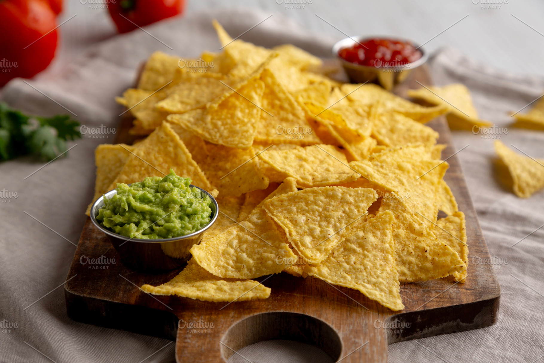 Homemade Corn Tortilla Chips with Tomato Salsa and Guacamole, a Food & Drink Photo by LiudmylaChuhunova