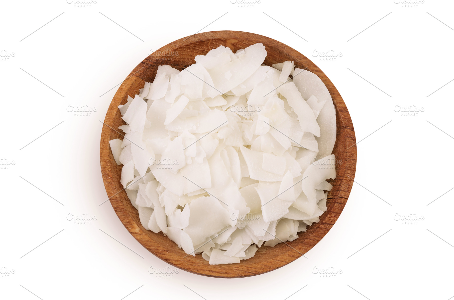 Coconut flakes or chips in wooden, a Food & Drink Photo by NataPhoto
