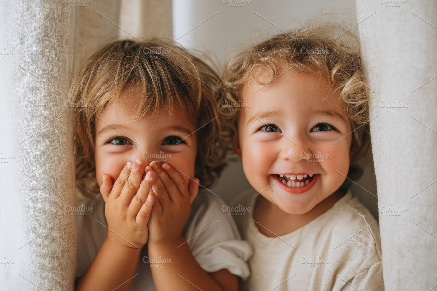 Two cheerful children peeking from behind a curtain, a Person Photo by AlyaAnd