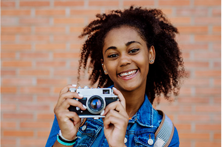 Multiracial girl standing in front, a Person Photo by HalfPoint
